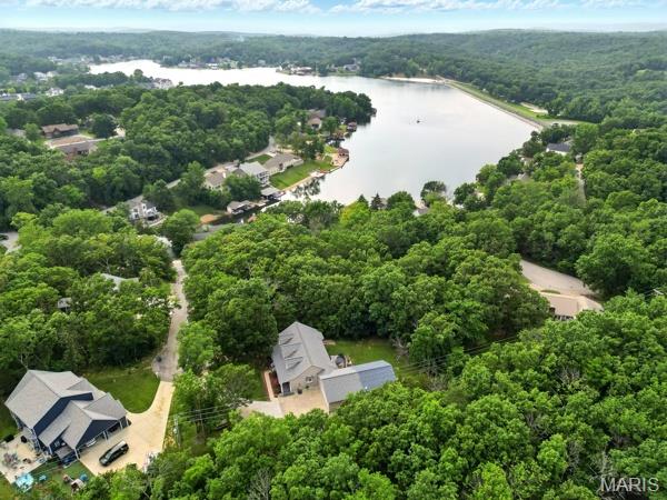 9 Sun Trail, Rise Trail, MO 63050 - aerial overview of property's location with a large body of water and a forest