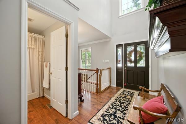 9 Sun Trail, Rise Trail, MO 63050 - entrance foyer with wood finished floors and crown molding