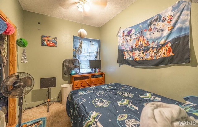 2008 Vienna Rd, Rolla, MO 65401 - carpeted bedroom featuring a textured ceiling and ceiling fan