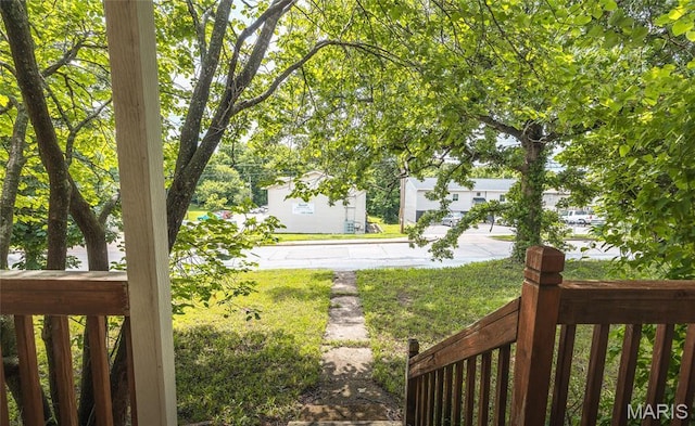 2008 Vienna Rd, Rolla, MO 65401 - view of grassy yard featuring covered porch