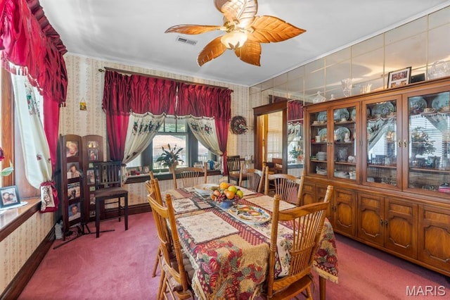 3623 Iowa Ave, Saint Louis, MO 63118 - dining room with wallpapered walls, carpet floors, a ceiling fan, and ornamental molding