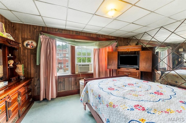 3623 Iowa Ave, Saint Louis, MO 63118 - bedroom featuring wood walls, cooling unit, carpet floors, and a drop ceiling