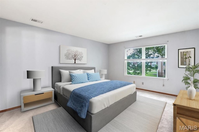 1308 Holgate Dr Unit G5, Ballwin, MO 63021 - bedroom featuring light colored carpet and baseboards
