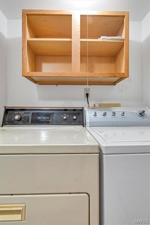 1308 Holgate Dr Unit G5, Ballwin, MO 63021 - washroom featuring washing machine and clothes dryer