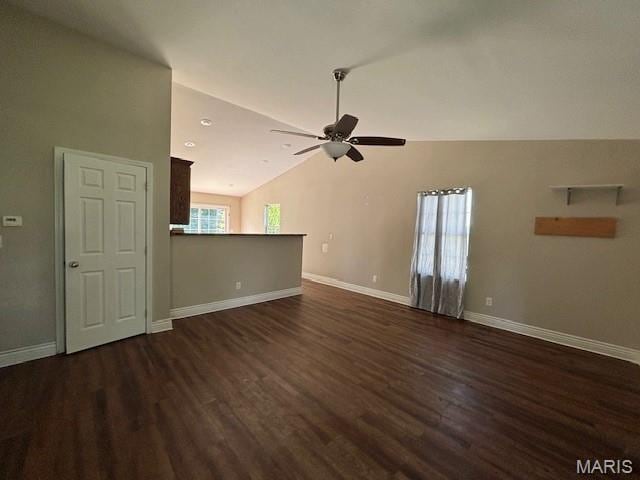 2069 State Highway H, Sikeston, MO 63801 - unfurnished living room featuring ceiling fan, dark wood finished floors, and vaulted ceiling