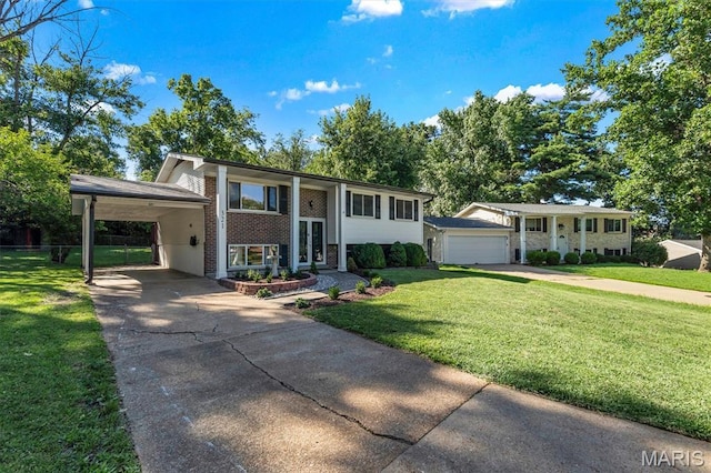 321 Fairview Ct, Ballwin, MO 63021 - bi-level home with concrete driveway, an attached carport, brick siding, and a garage