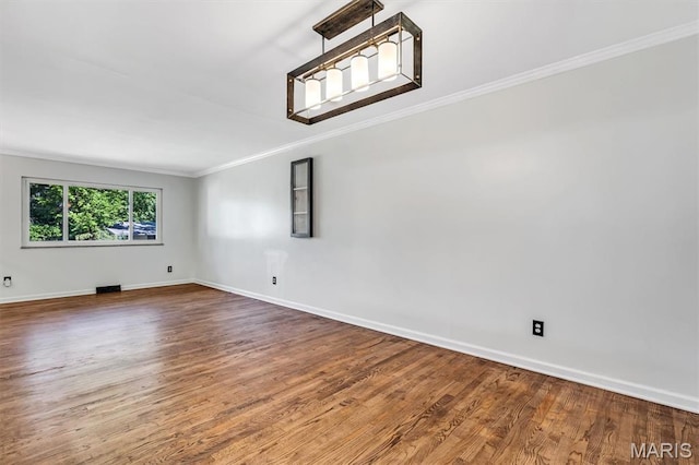 321 Fairview Ct, Ballwin, MO 63021 - unfurnished room with ornamental molding and wood finished floors