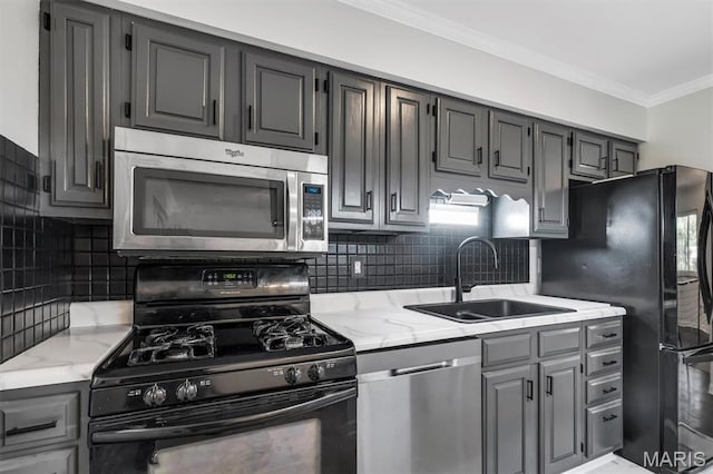321 Fairview Ct, Ballwin, MO 63021 - kitchen with black appliances, gray cabinets, crown molding, decorative backsplash, and light stone countertops