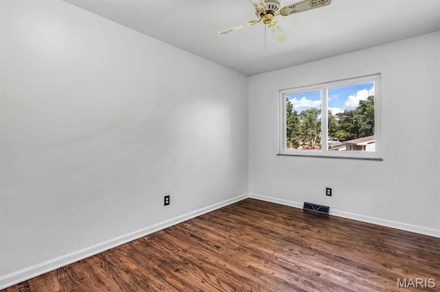 321 Fairview Ct, Ballwin, MO 63021 - spare room featuring dark wood-style flooring and ceiling fan
