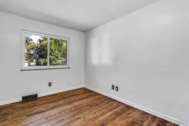321 Fairview Ct, Ballwin, MO 63021 - unfurnished room featuring baseboards and dark wood finished floors