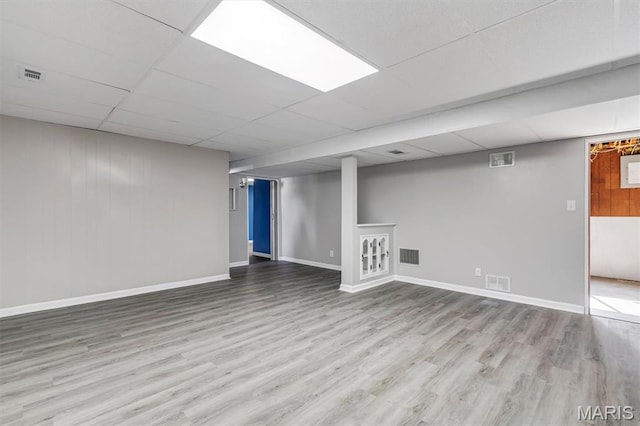 321 Fairview Ct, Ballwin, MO 63021 - finished below grade area with wood finished floors and a paneled ceiling