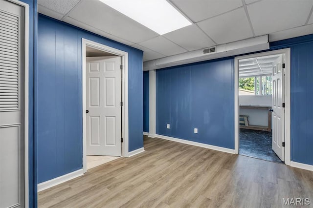 321 Fairview Ct, Ballwin, MO 63021 - unfurnished room with wood finished floors and a drop ceiling