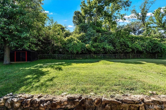 321 Fairview Ct, Ballwin, MO 63021 - view of yard with a storage unit