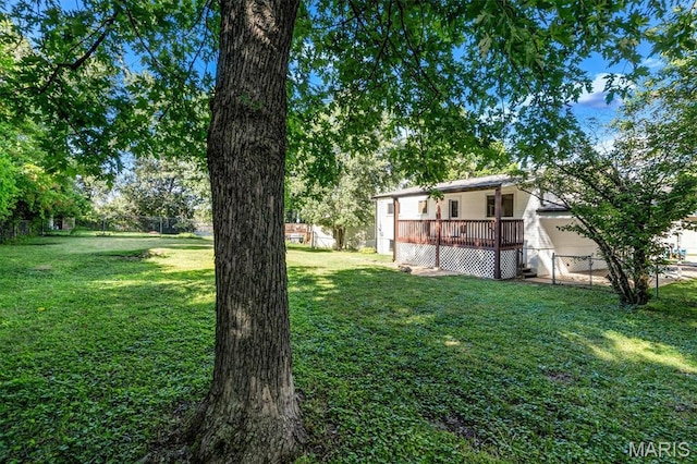 321 Fairview Ct, Ballwin, MO 63021 - fenced backyard with a wooden deck