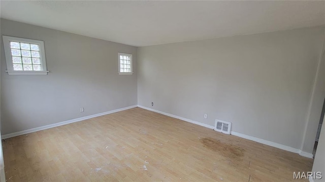 1938 Damato Ct, Jennings, MO 63136 - spare room with light wood-style flooring