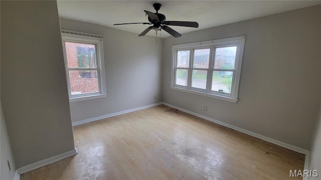 1938 Damato Ct, Jennings, MO 63136 - unfurnished room featuring light wood-style flooring and ceiling fan