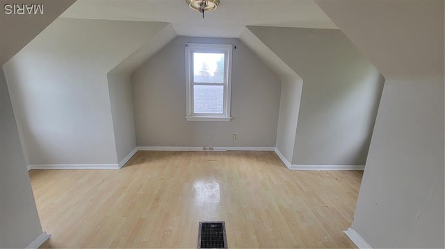 1938 Damato Ct, Jennings, MO 63136 - additional living space with wood finished floors and lofted ceiling