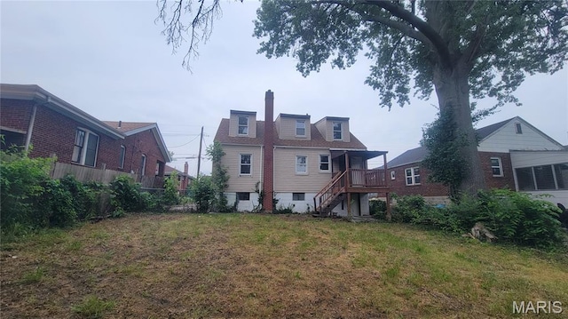 1938 Damato Ct, Jennings, MO 63136 - rear view of property with a chimney and stairway