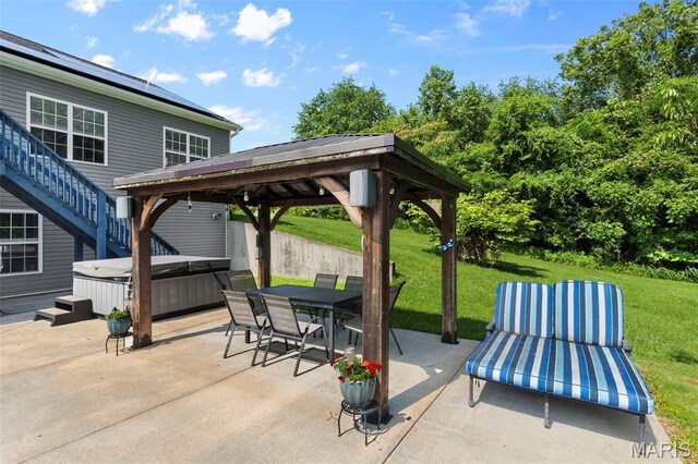 1638 County Road 642, Cape Girardeau, MO 63701 - view of patio / terrace featuring a hot tub, a gazebo, outdoor dining space, and stairway