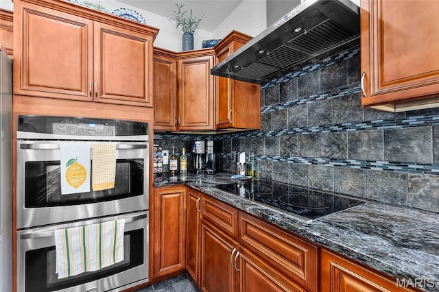 1638 County Road 642, Cape Girardeau, MO 63701 - kitchen with double oven, wall chimney exhaust hood, black electric stovetop, backsplash, and dark stone countertops
