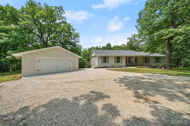 178 Spring Branch Rd, Troy, MO 63379 - ranch-style house with a detached garage, an outdoor structure, and view of scattered trees