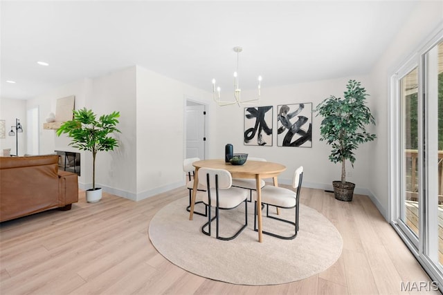 178 Spring Branch Rd, Troy, MO 63379 - dining area featuring a chandelier, light wood-type flooring, and recessed lighting