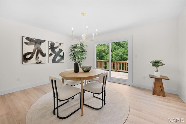 178 Spring Branch Rd, Troy, MO 63379 - dining room with a chandelier and light wood-style flooring