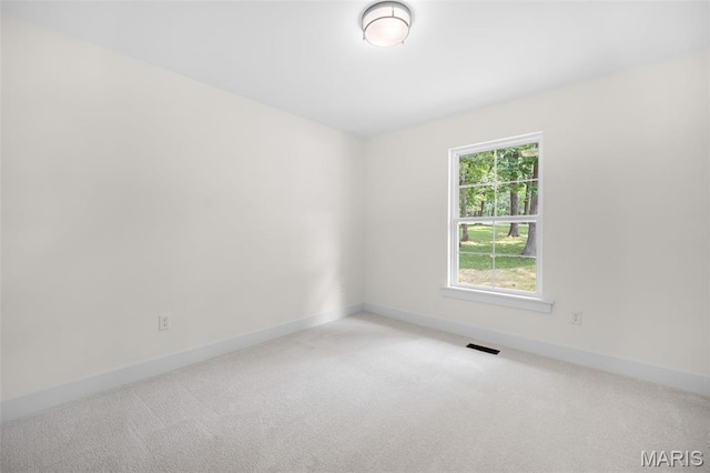 178 Spring Branch Rd, Troy, MO 63379 - carpeted empty room with baseboards