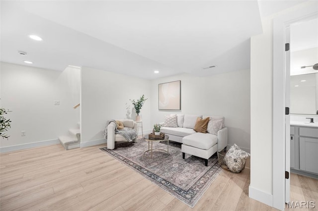 178 Spring Branch Rd, Troy, MO 63379 - living area featuring stairs, light wood finished floors, and recessed lighting
