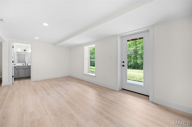 178 Spring Branch Rd, Troy, MO 63379 - unfurnished living room featuring light wood-style flooring and recessed lighting