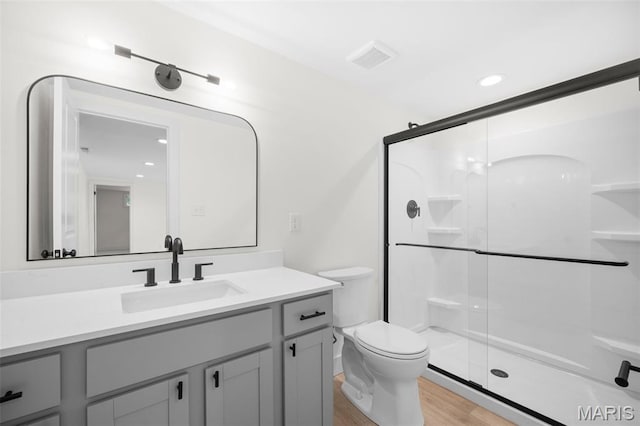 178 Spring Branch Rd, Troy, MO 63379 - full bathroom with vanity, a stall shower, wood finished floors, and recessed lighting