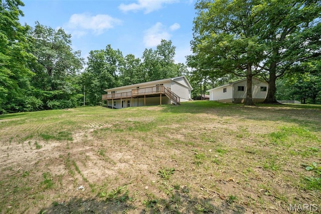 178 Spring Branch Rd, Troy, MO 63379 - view of grassy yard featuring a deck and stairway