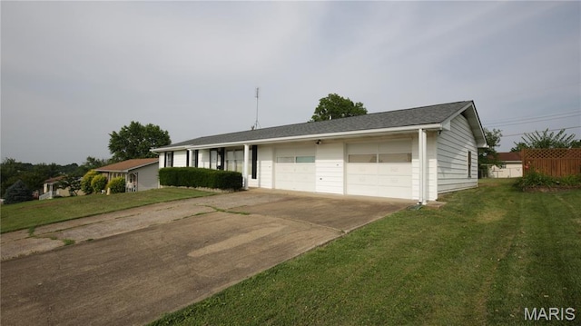 517 N 11th, De Soto, MO 63020 - ranch-style house featuring an attached garage, driveway, and a front lawn