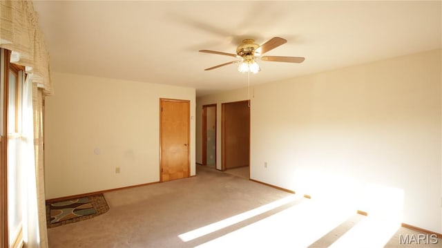 517 N 11th, De Soto, MO 63020 - spare room with ceiling fan and light colored carpet