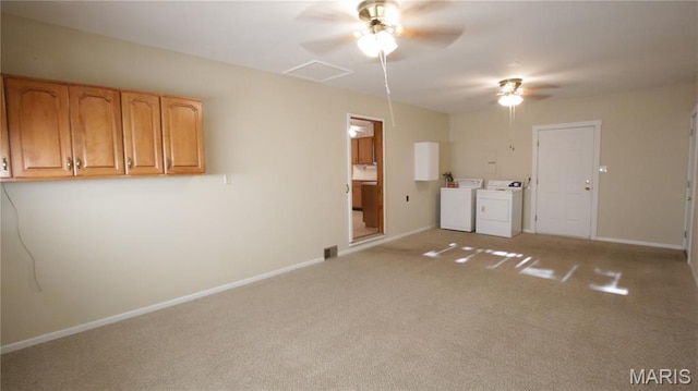 517 N 11th, De Soto, MO 63020 - empty room featuring washer and dryer, a ceiling fan, and light carpet