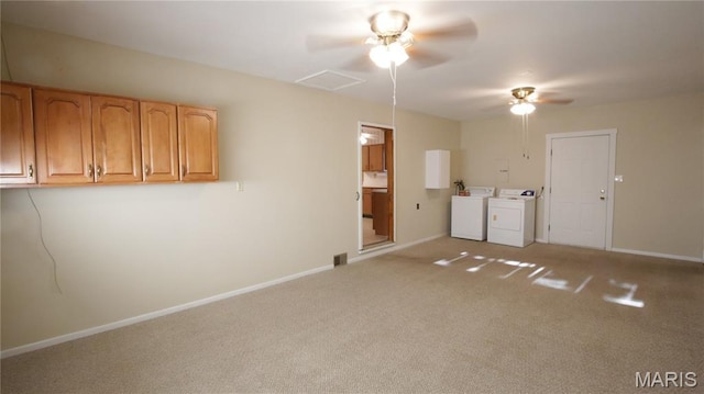 517 N 11th, De Soto, MO 63020 - empty room with washer and clothes dryer, ceiling fan, and light colored carpet