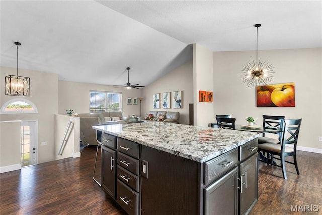 757 N W Ln, Jackson, MO 63755 - kitchen with a chandelier, dark wood-type flooring, open floor plan, a ceiling fan, and hanging light fixtures