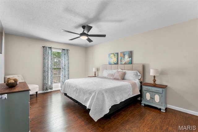 757 N W Ln, Jackson, MO 63755 - bedroom with dark wood-style flooring, ceiling fan, and a textured ceiling