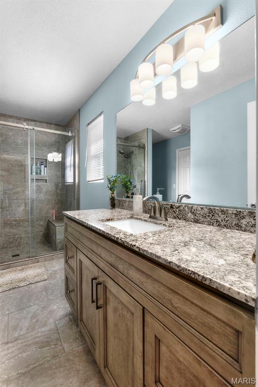 757 N W Ln, Jackson, MO 63755 - full bathroom with vanity and a shower stall