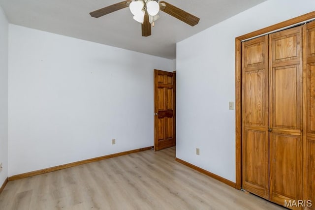 19395 Ripley Dr, Lebanon, MO 65536 - unfurnished bedroom with light wood finished floors, baseboards, and a closet