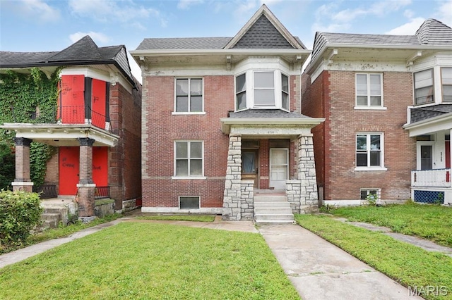 5718 Etzel Ave, Saint Louis, MO 63112 - view of front of house with a front yard and brick siding