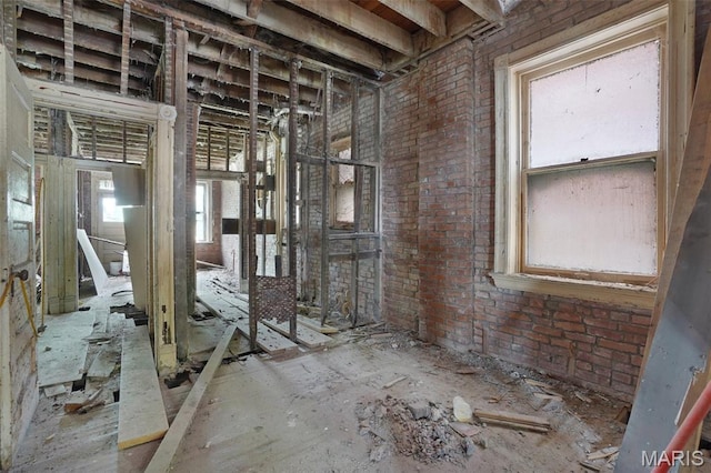 5718 Etzel Ave, Saint Louis, MO 63112 - miscellaneous room featuring brick wall