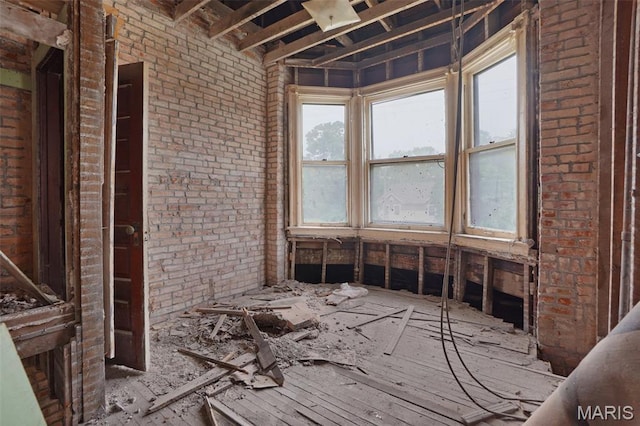 5718 Etzel Ave, Saint Louis, MO 63112 - misc room featuring brick wall