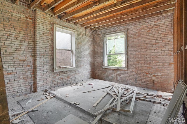 5718 Etzel Ave, Saint Louis, MO 63112 - misc room featuring brick wall
