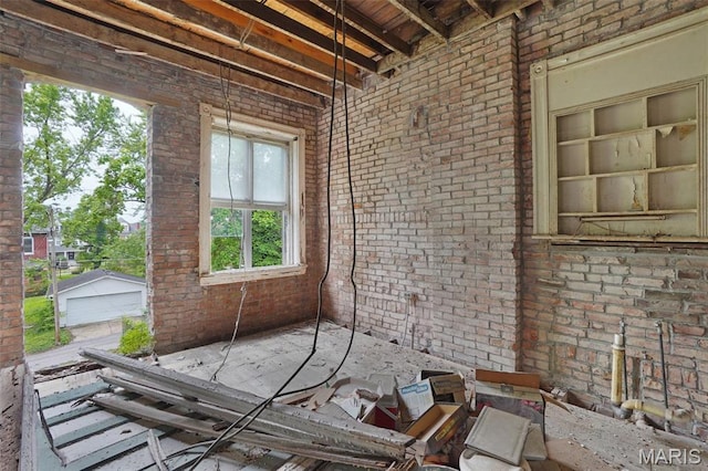 5718 Etzel Ave, Saint Louis, MO 63112 - miscellaneous room featuring brick wall