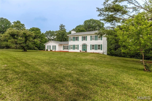 17560 Old Jamestown Rd, Florissant, MO 63034 - colonial-style house with a chimney and a front lawn