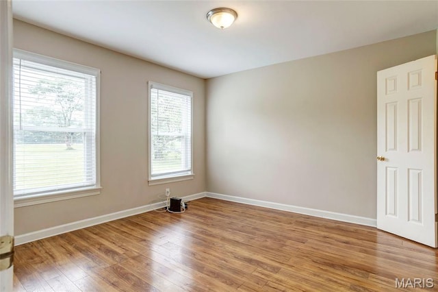 17560 Old Jamestown Rd, Florissant, MO 63034 - unfurnished room with light wood finished floors and baseboards