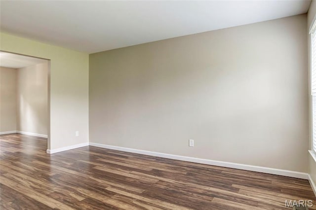 17560 Old Jamestown Rd, Florissant, MO 63034 - spare room with dark wood-style flooring and baseboards