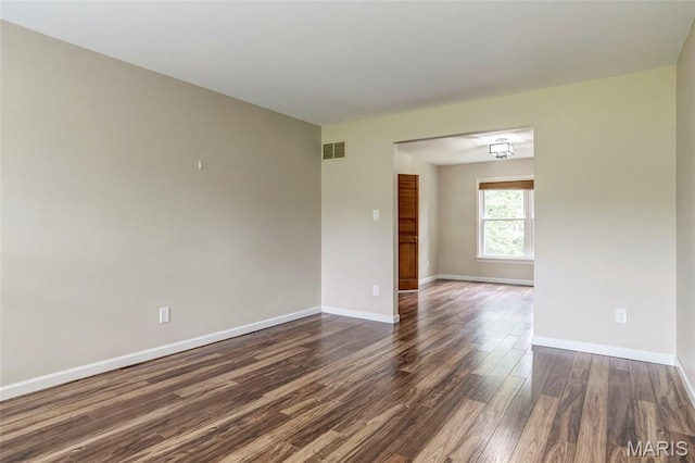 17560 Old Jamestown Rd, Florissant, MO 63034 - unfurnished room with dark wood-style floors and baseboards