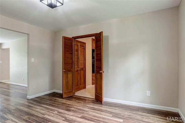 17560 Old Jamestown Rd, Florissant, MO 63034 - empty room featuring wood finished floors and baseboards